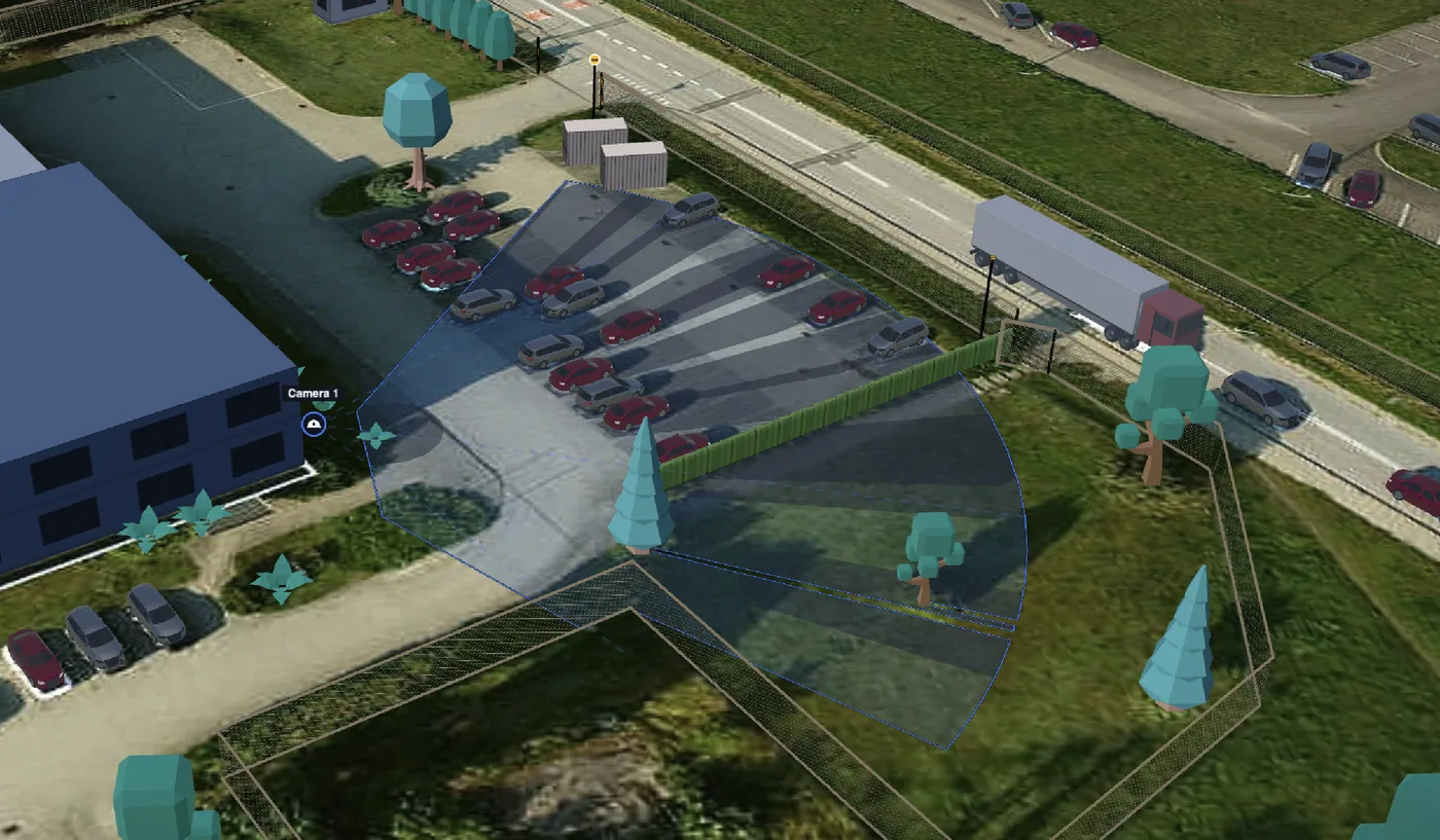 3D view of the same site: Camera 1 on the office wall with its field of view laid over the car park, with the parked cars, trees and the fence in place